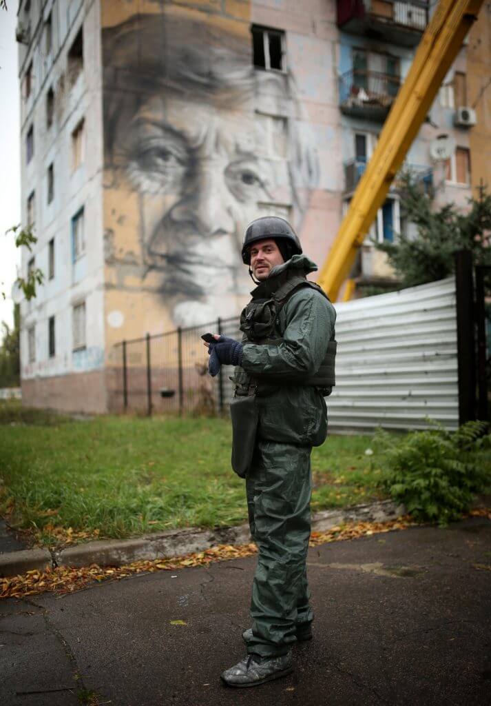 Guido Van Helton, Street Art Project, Art United Us, Avdiyivka, Ukraine. Photo Credit Amos Chapple/RFE/RL