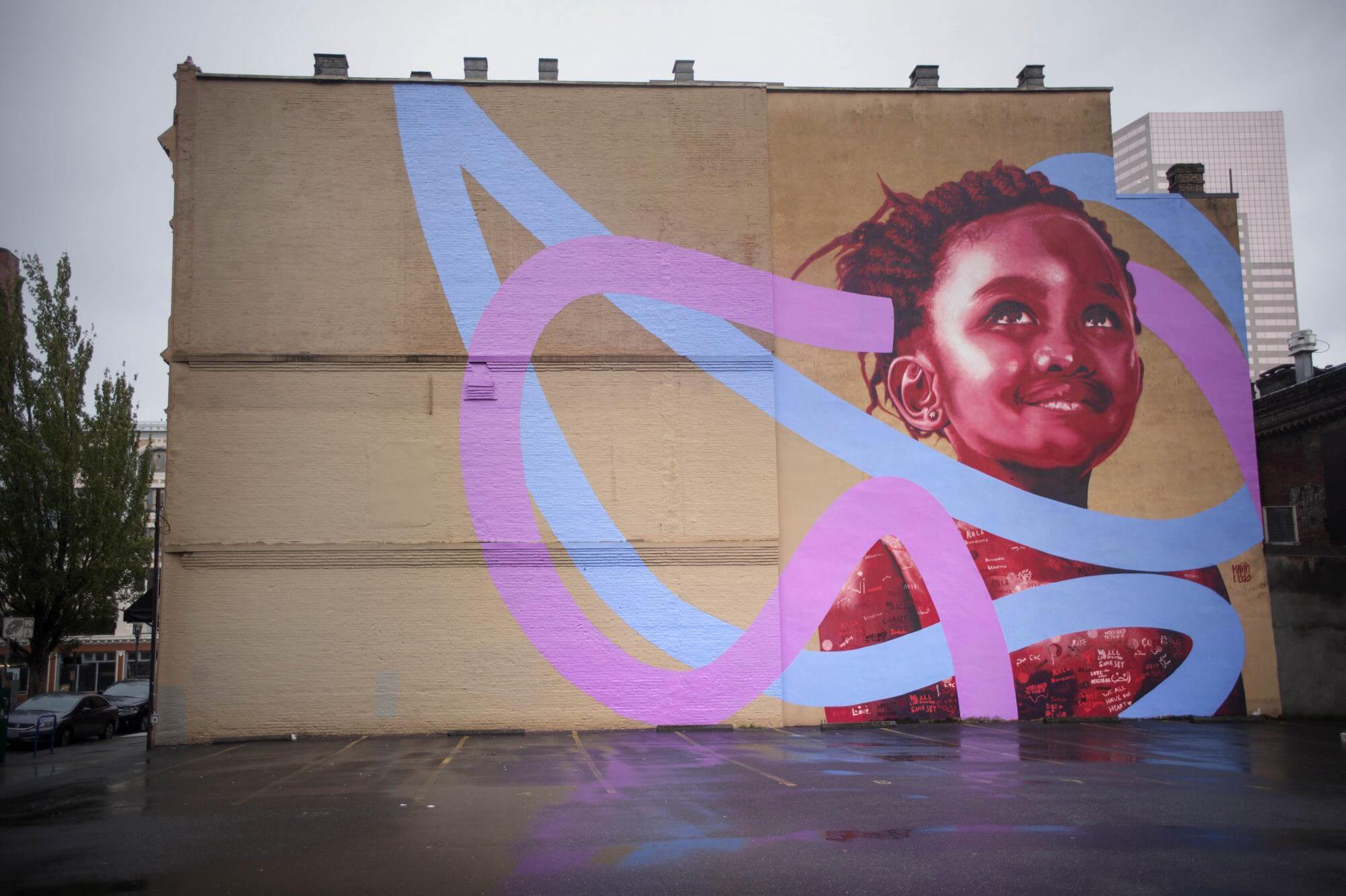 Street artist Kevin Ledo paints outside the lines in Portland, 2016
