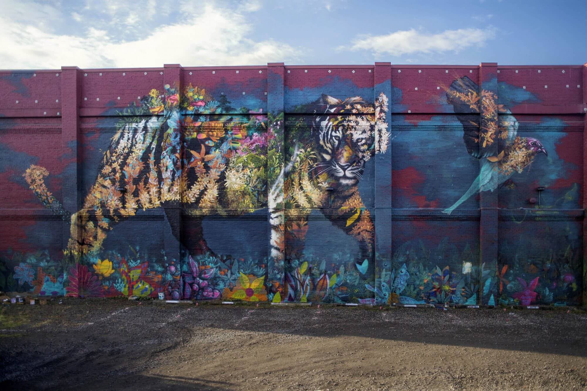Street artist Ernesto Maranje paints outside the lines in Portland, 2016