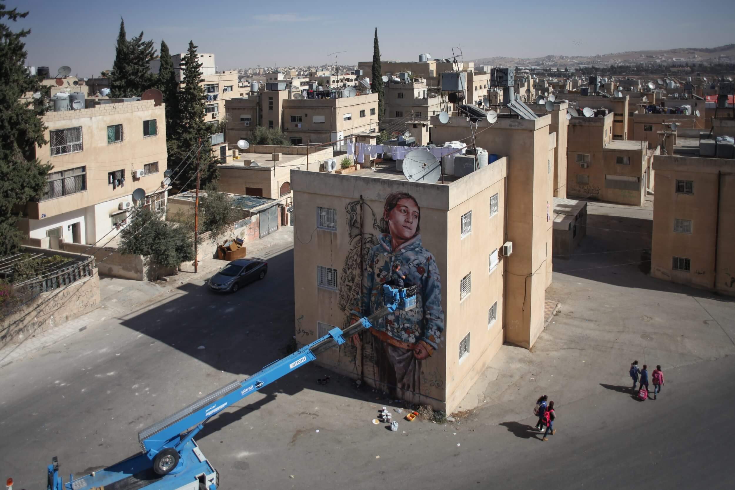 Street artists Fintan Magee and Suhaib Attar paint Syria’s lost children a home, Jordan 2016