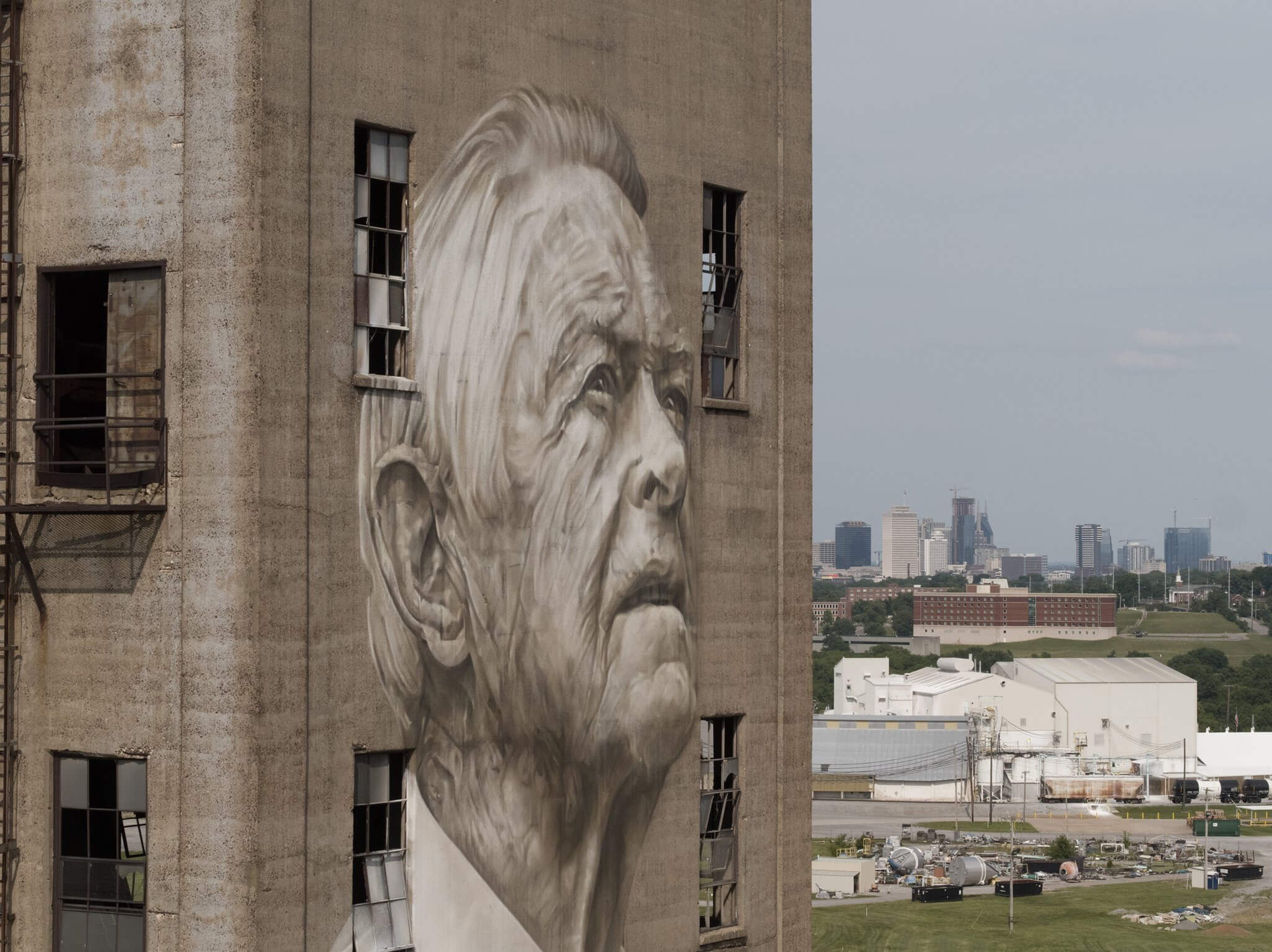 Guido Van Helten paints the Pillar of The Nations Community, Nashville Walls Project 2017