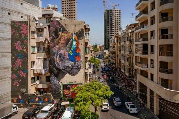 Ernesto Maranje, The Rhino and the Oxpecker, Street Art Mural, Paint Outside The Lines Lebanon 2017. Photo Credit Selina Miles