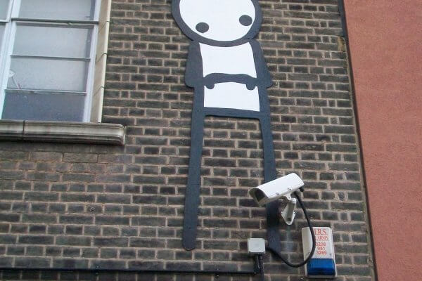 Stik, Wooden Stik Sculpture "Up on the Roof" to be auctioned off at Christies Auction House for Cardboard Citizens Charity 2018. Photo Credit Stik