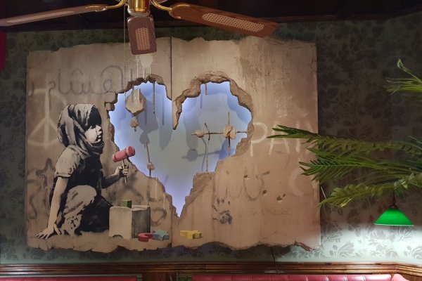 Banksy artwork, The Walled Off Hotel, West Bank, Bethlehem, Palestine 2019.