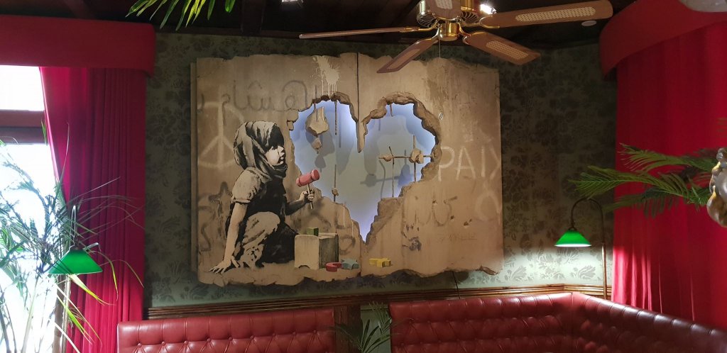 Banksy artwork, The Walled Off Hotel, West Bank, Bethlehem, Palestine 2019.