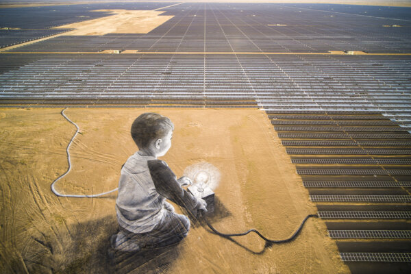 Saype giant landart painting at the Ibri solar farm, Ibri 2 IPP Project, in Oman 2023. Image © Saype