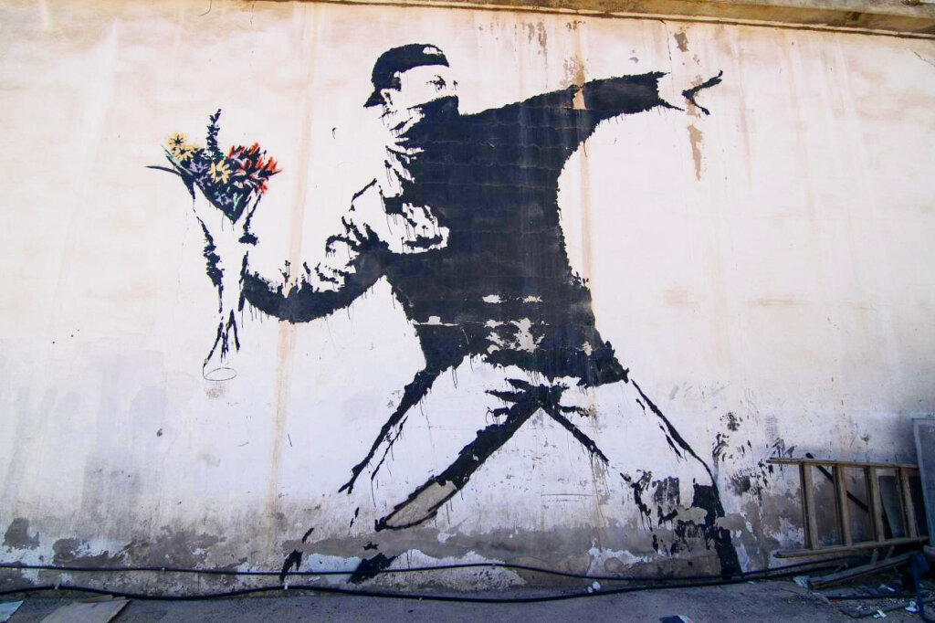 Banksy - Love is in the Air (Flower Thrower) Image @ GraffitiStreet.com