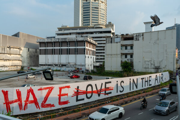 Ernest Zacharevic, SPLASH and BURN: Art Activism Holding Polluters to Account, Malaysia 2023. Photo Credit Antoine Loncle