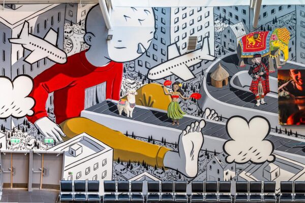 "Baggage Claim" Mural by Millo at Stavanger Airport: A Beautiful Representation of Travel and Unity. Image © Brian Tallman