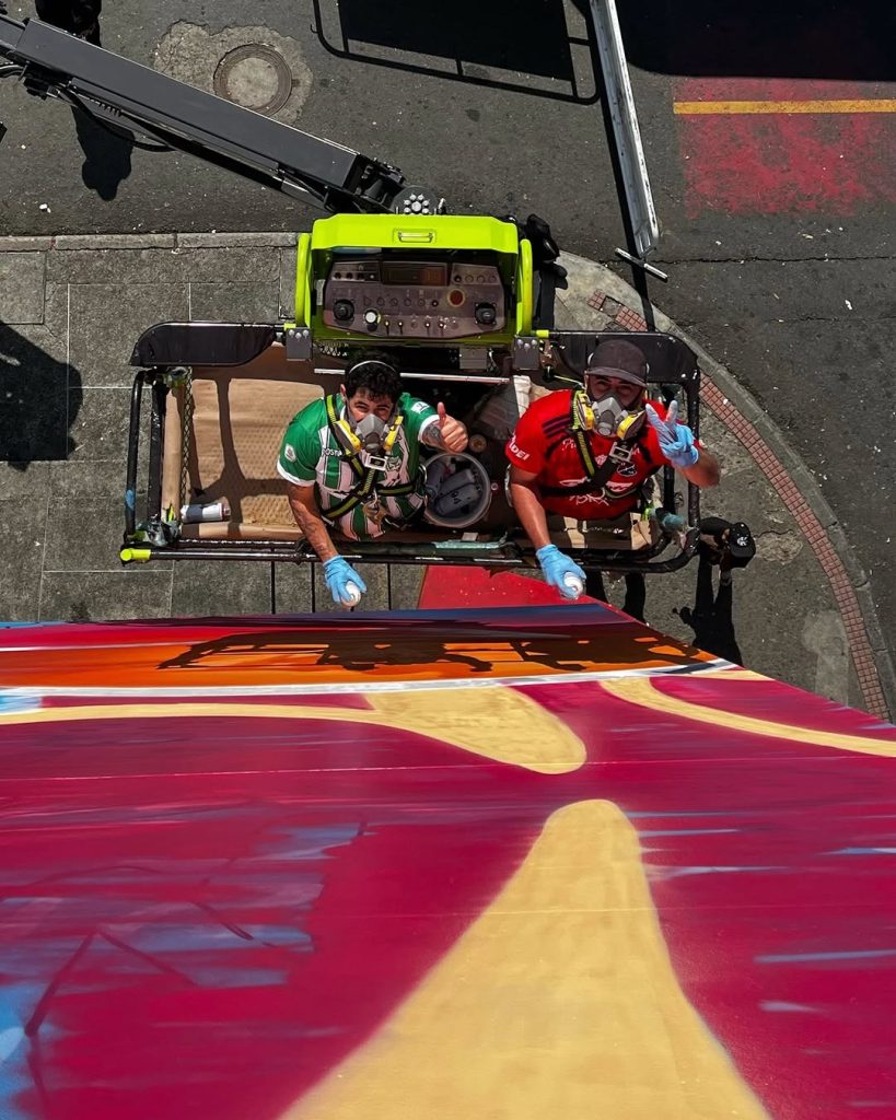 PichiAvo painting Atlas street art mural Medellin Colombia