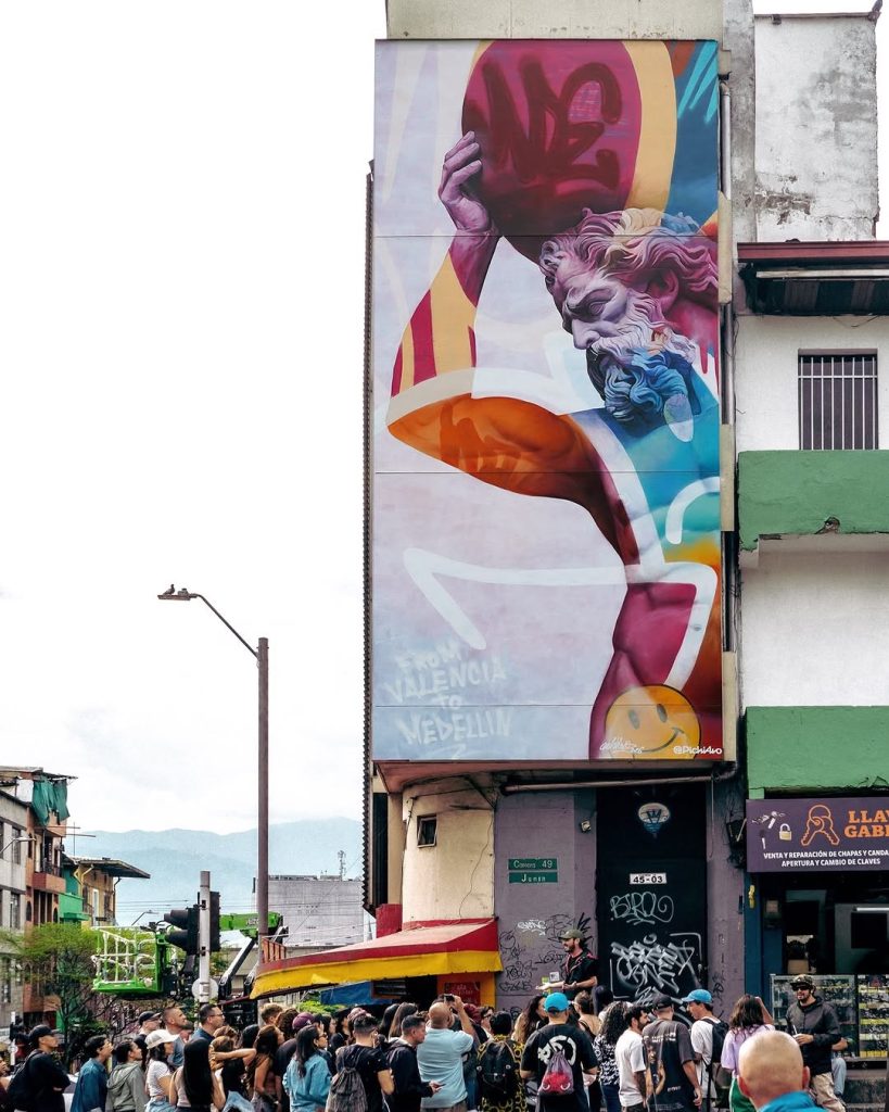 PichiAvo Atlas mural Medellin street art festival crowd