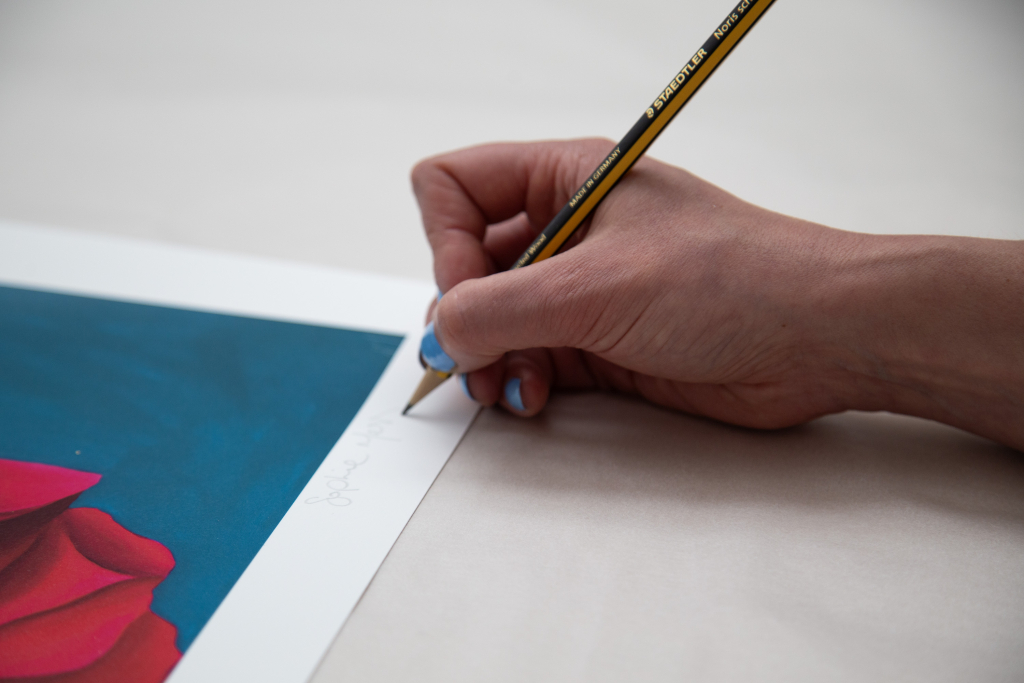 Sophie Mess hand-signing limited editions